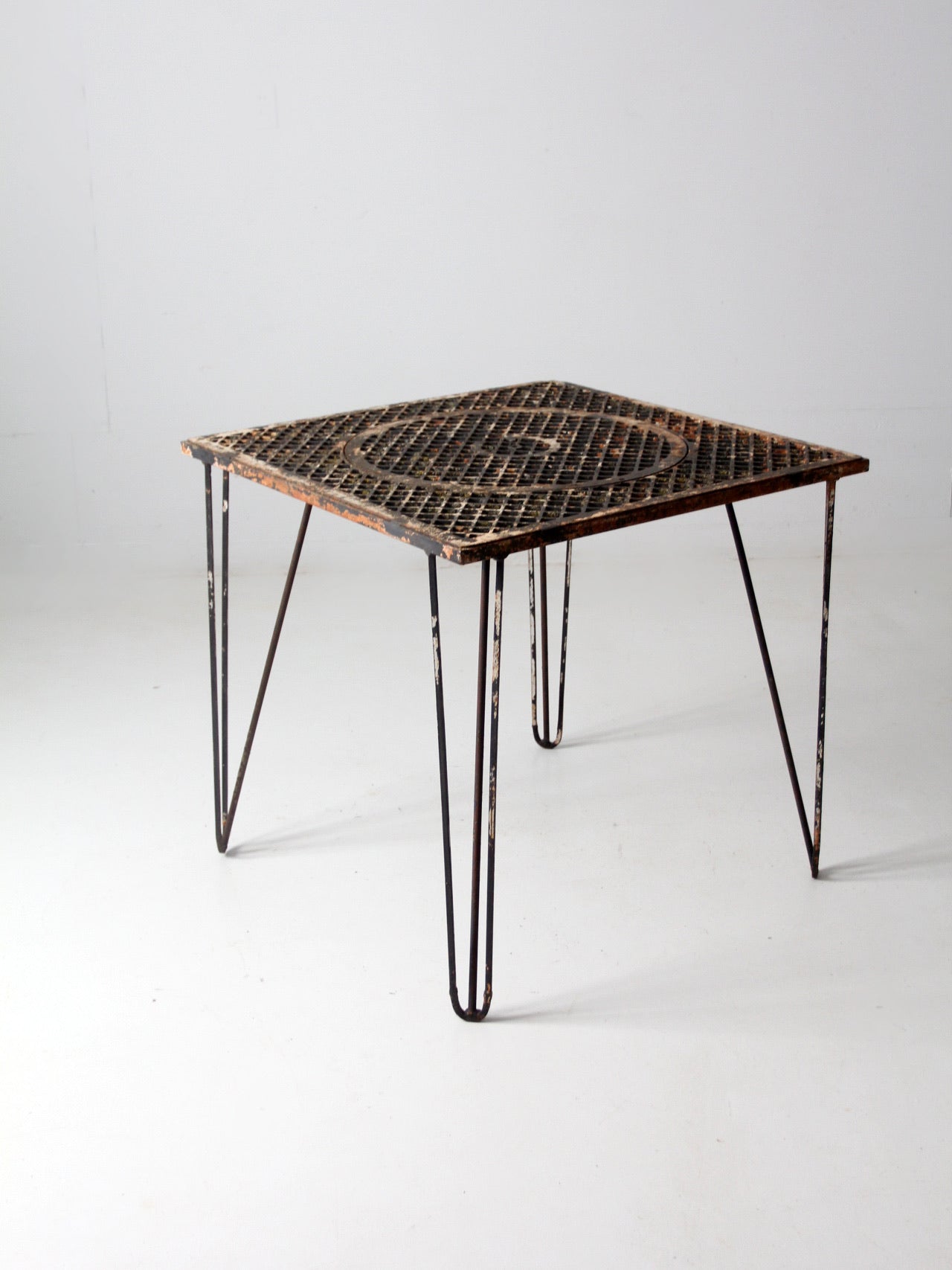 mid-century hairpin leg iron table