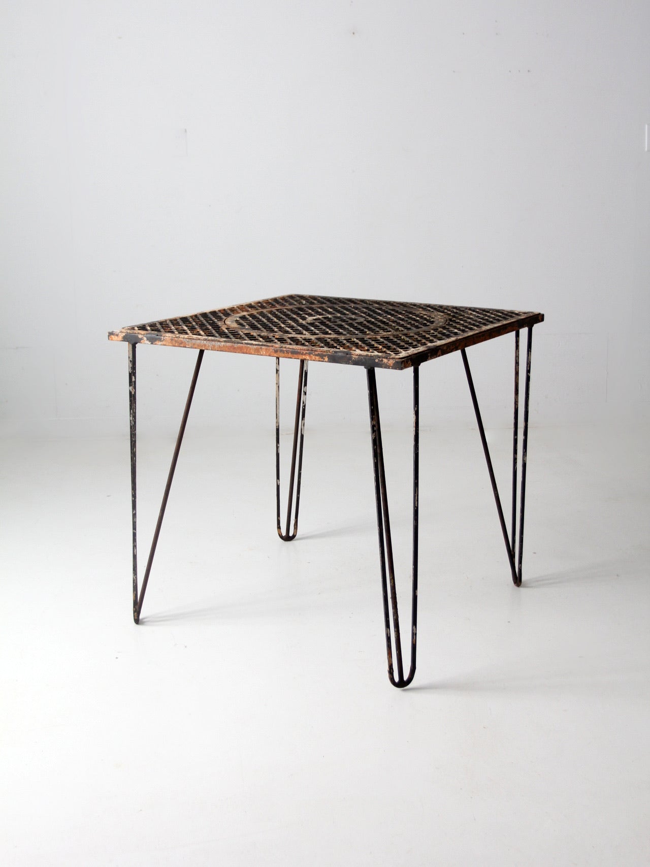 mid-century hairpin leg iron table