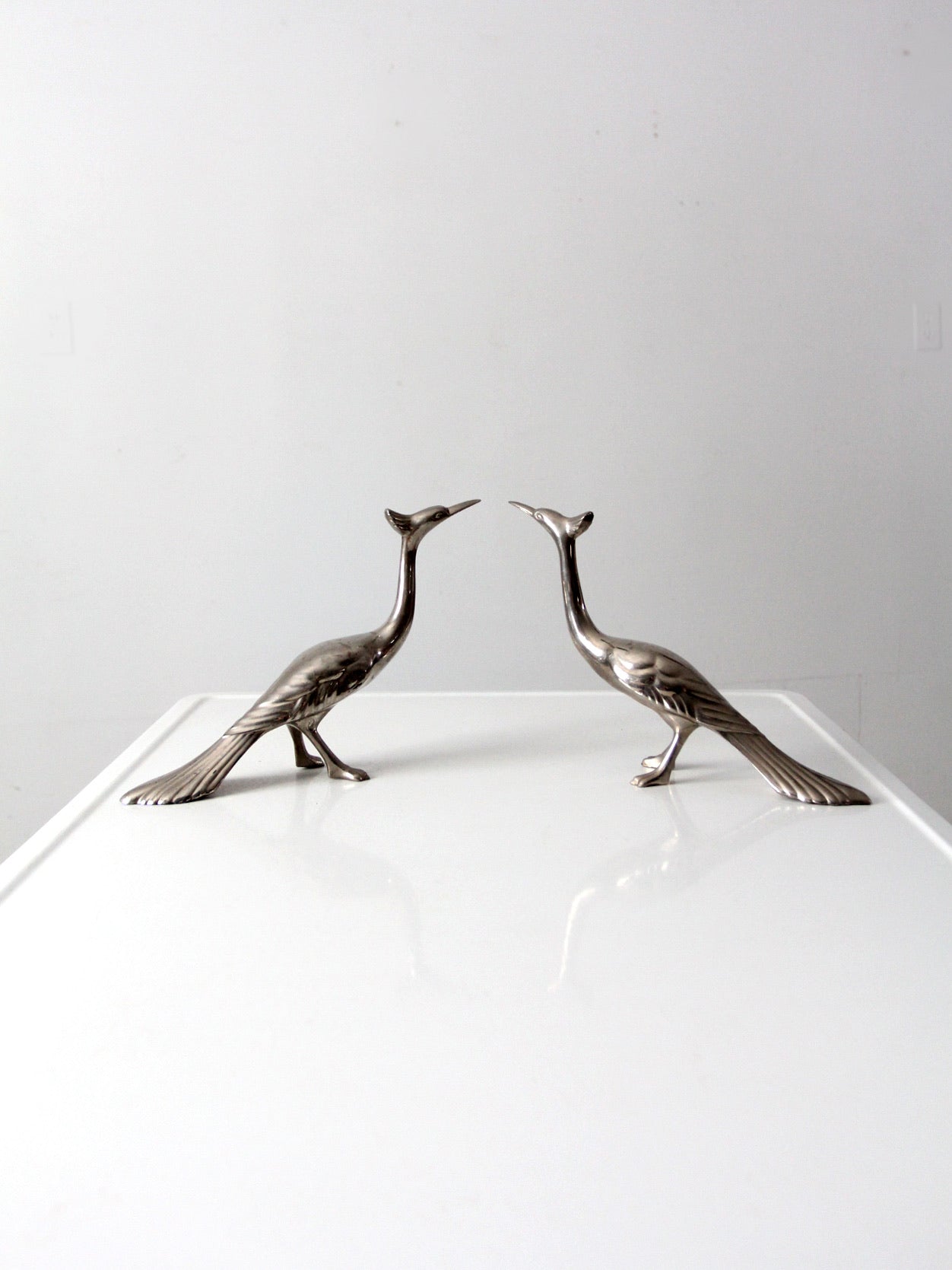 mid-century peacock figurines pair