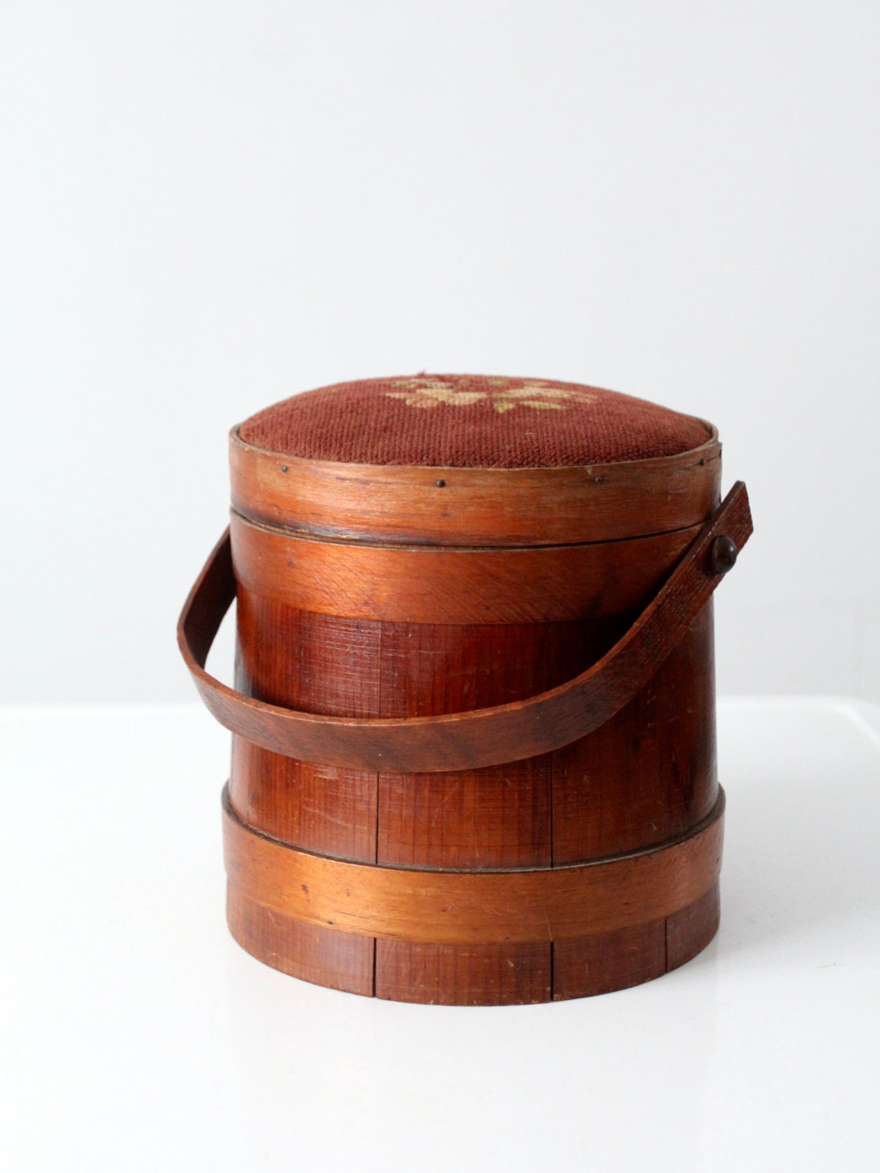 antique firkin with needlepoint lid