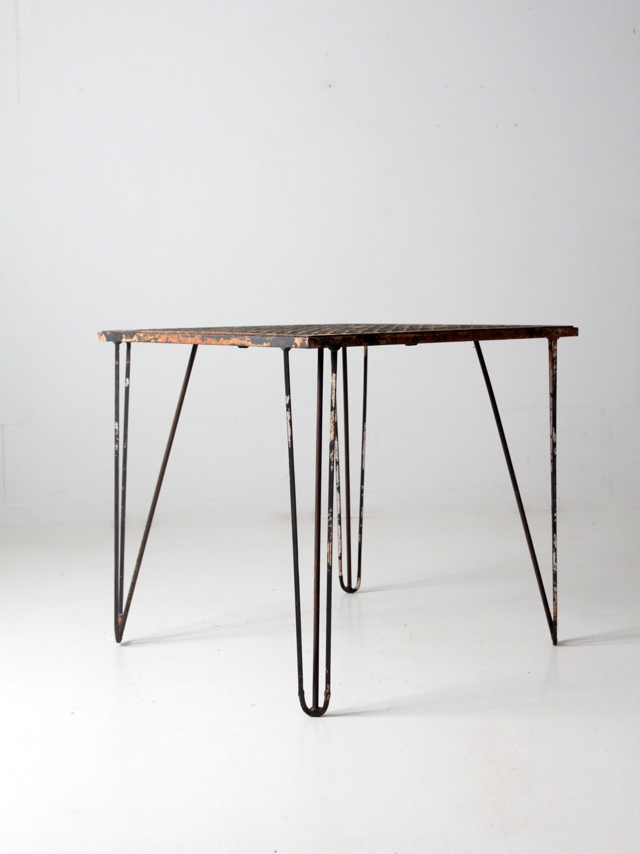 mid-century hairpin leg iron table