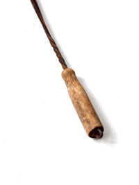 antique rug beater