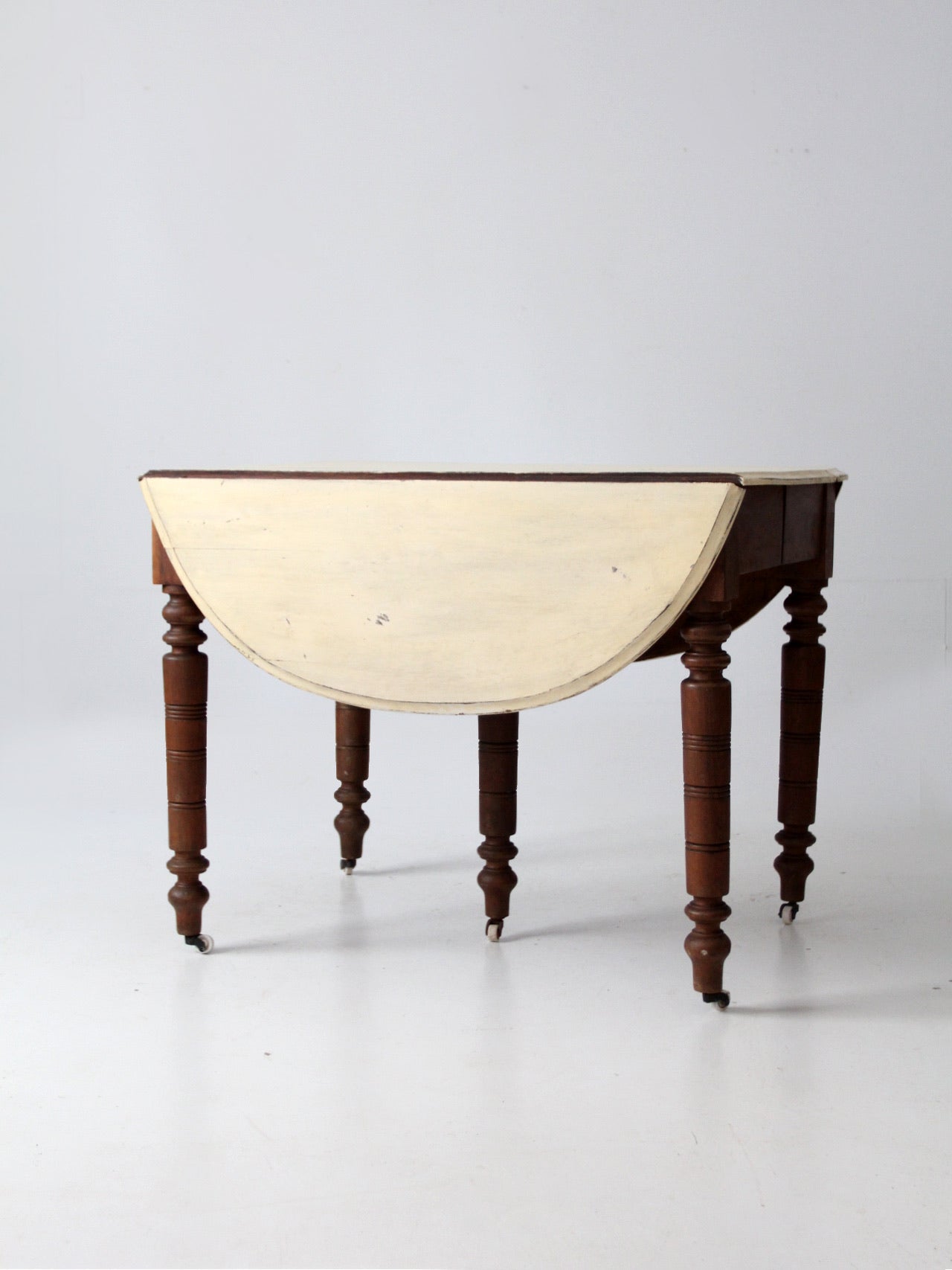 antique drop leaf table with fifth leg