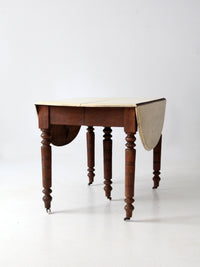 antique drop leaf table with fifth leg