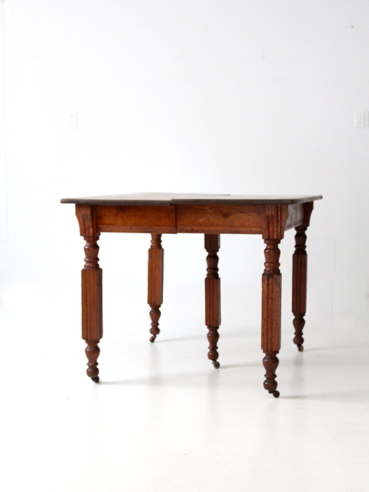 antique five leg dining table