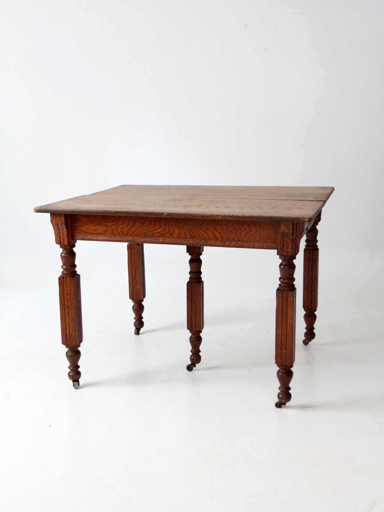 antique five leg dining table