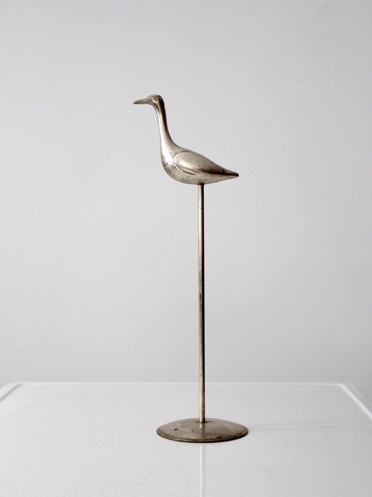 mid-century bird statue