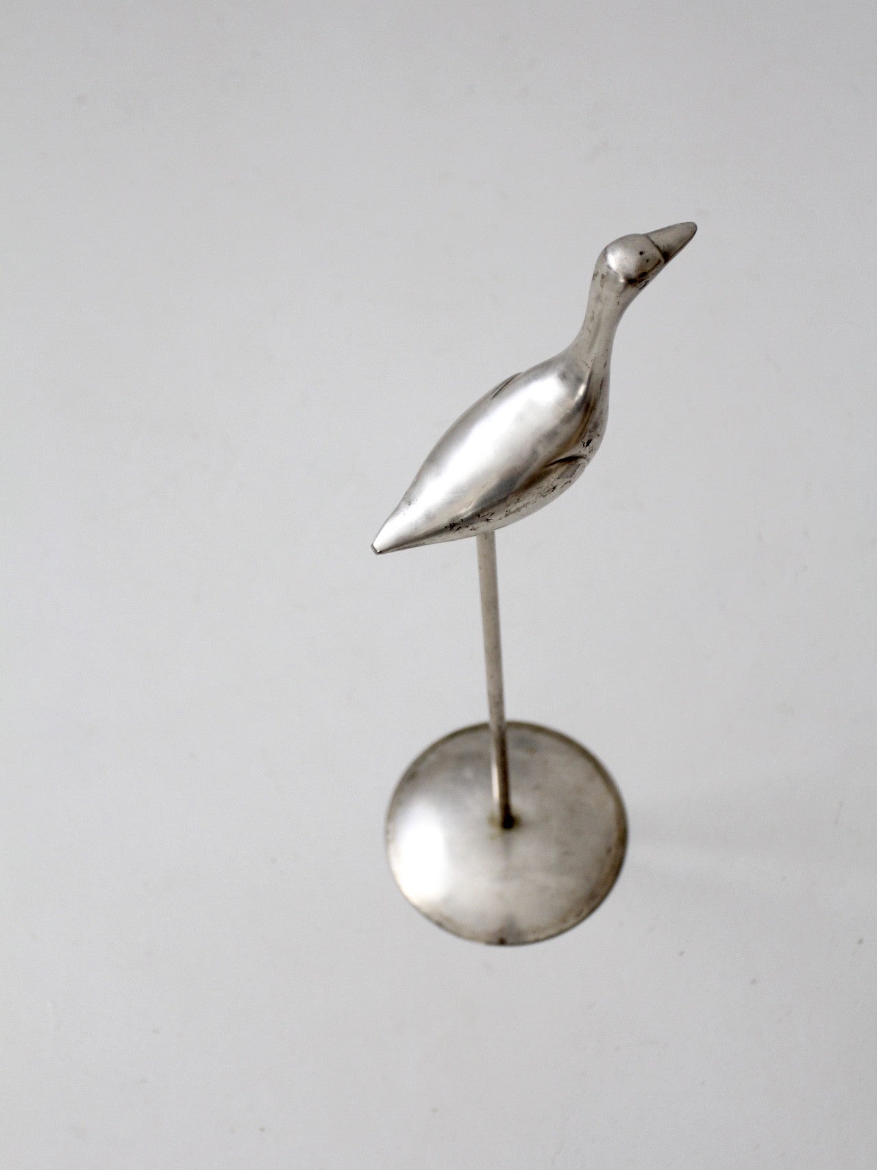 mid-century bird statue