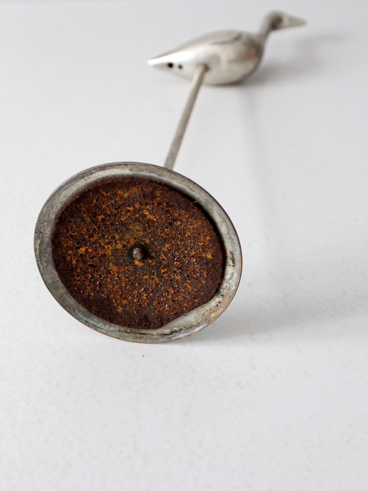 mid-century bird statue