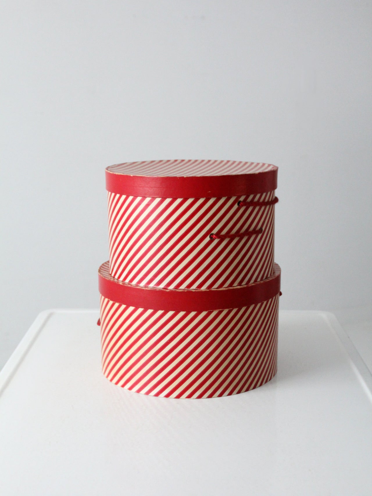 vintage candy cane stripe hat boxes pair