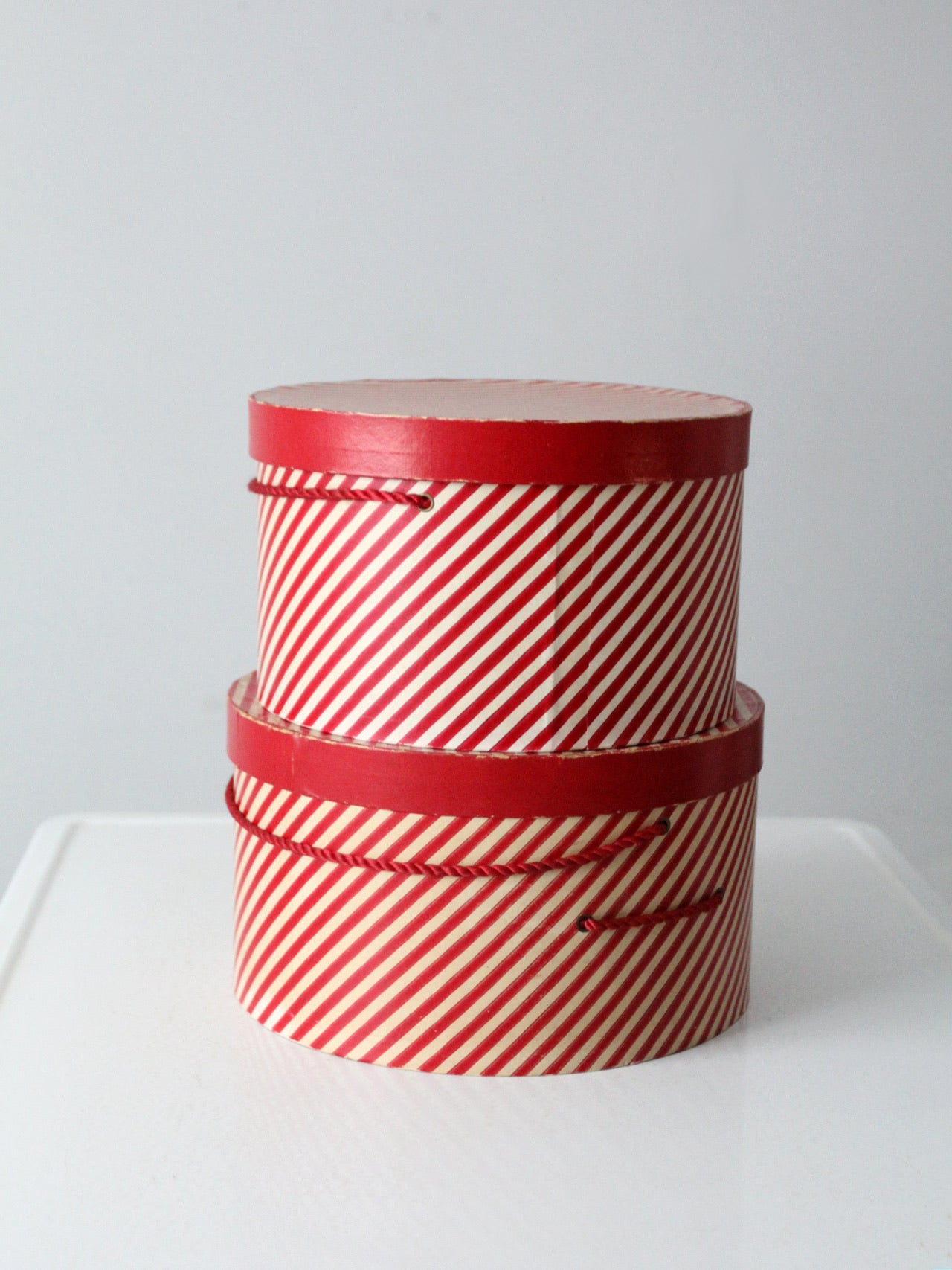 vintage candy cane stripe hat boxes pair