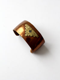 vintage Mexican copper cuff with brass sun pyramid