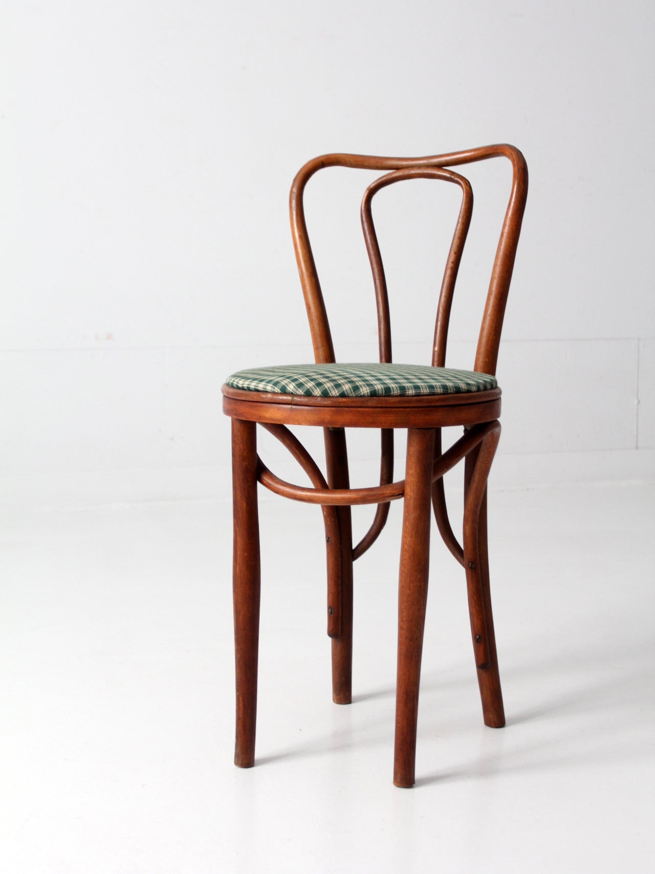 antique bentwood chair with upholstered seat