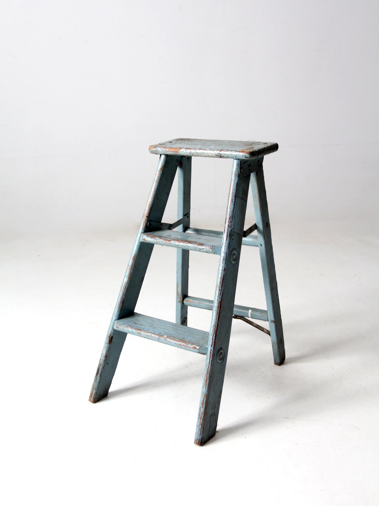 vintage wooden blue step ladder