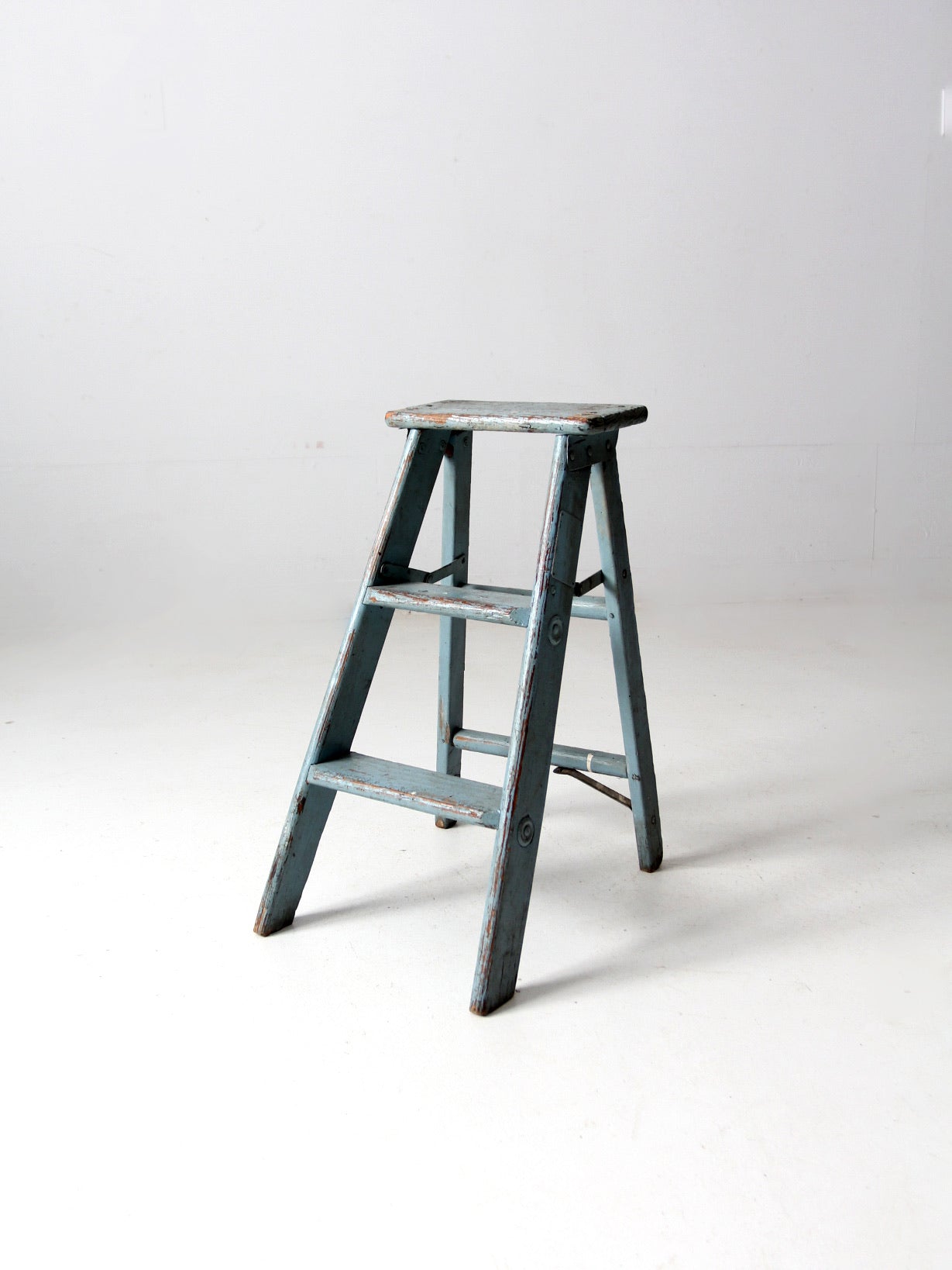 vintage wooden blue step ladder