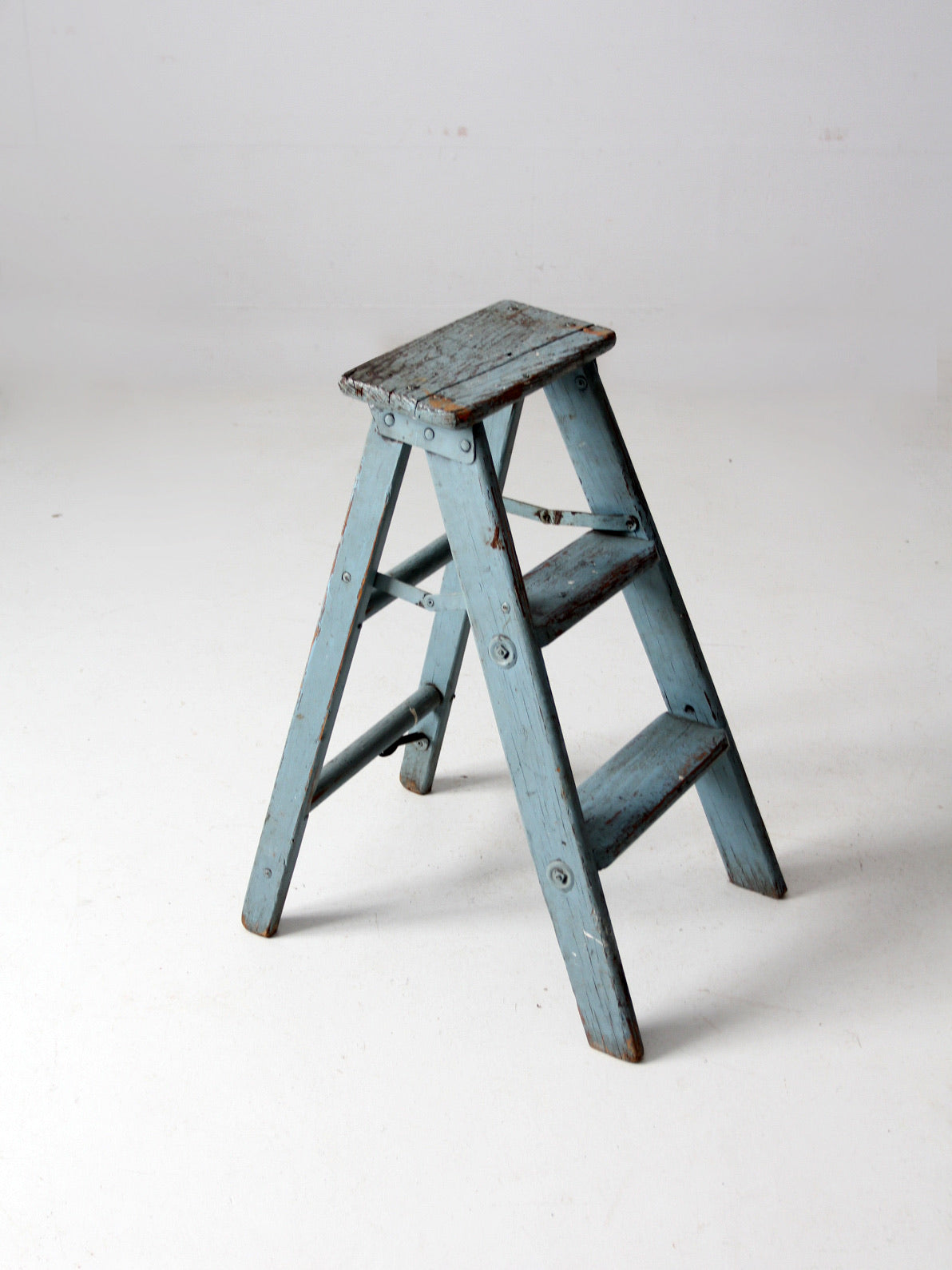 vintage wooden blue step ladder