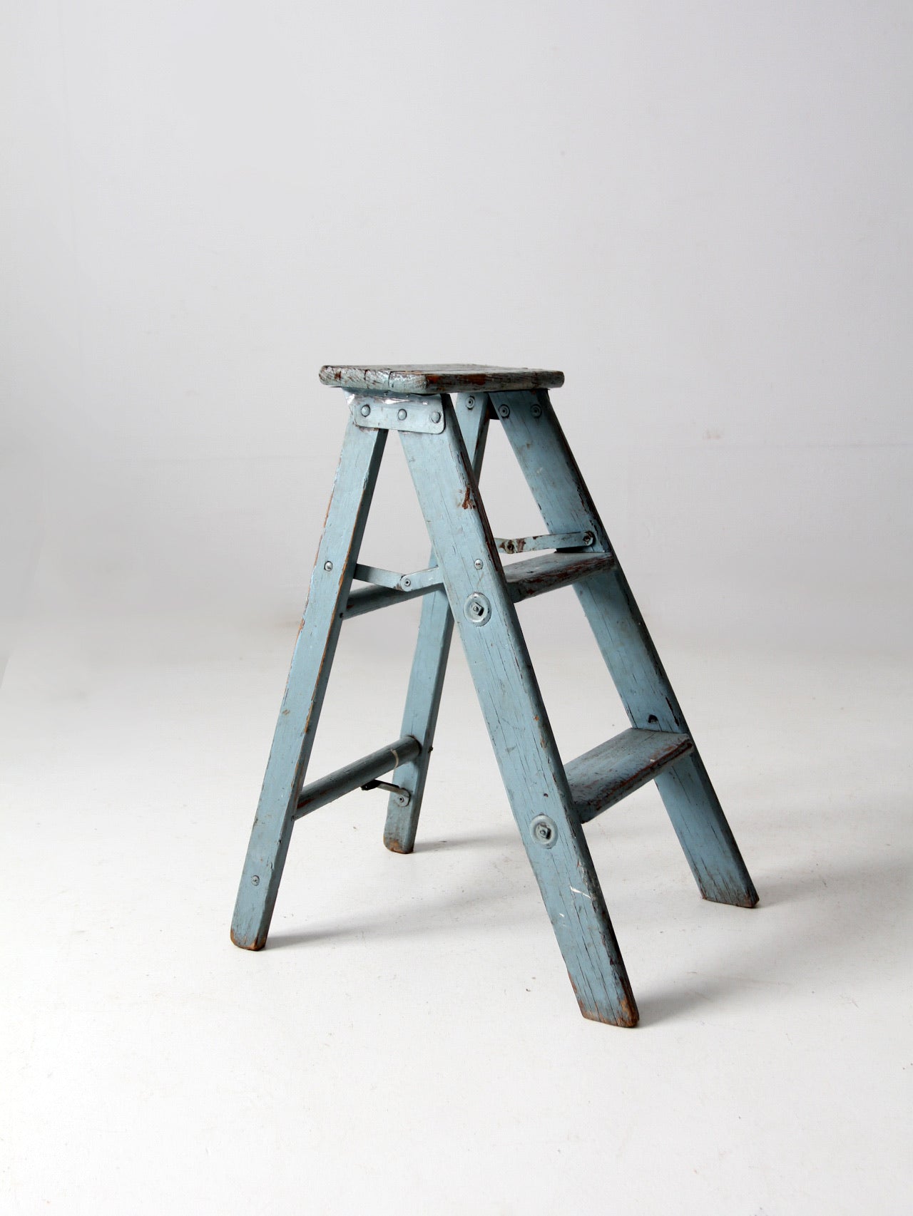 vintage wooden blue step ladder