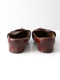 antique carved wood clogs