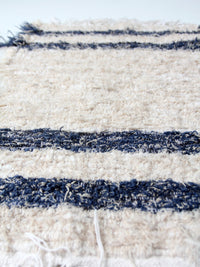 vintage hand loomed rug pair