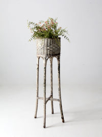 antique white wicker planter