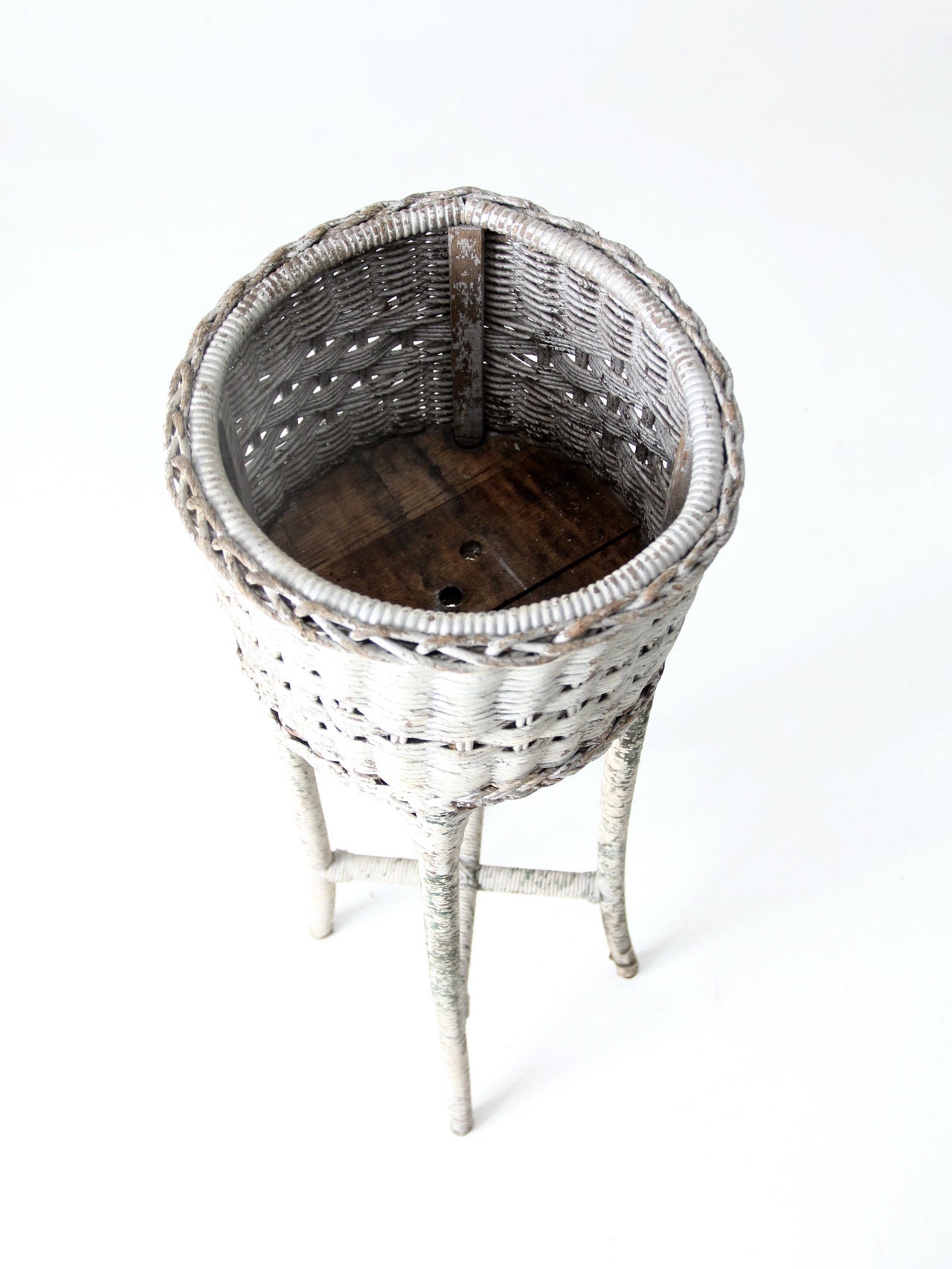 antique white wicker planter