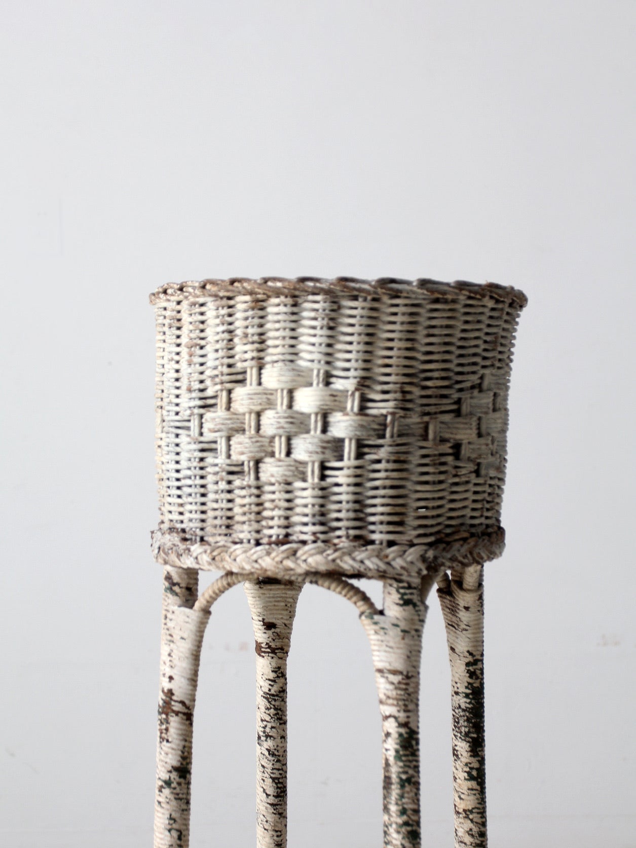 antique white wicker planter