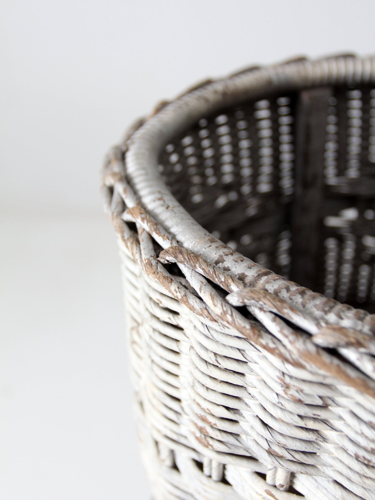 antique white wicker planter