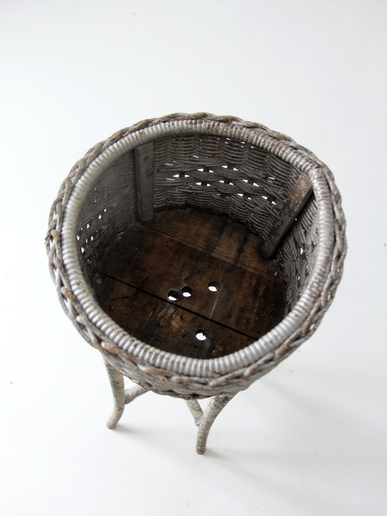 antique white wicker planter