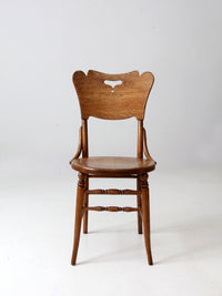 antique bentwood chair with cutout back