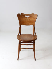 antique bentwood chair with cutout back