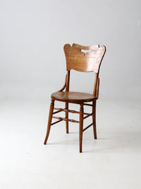 antique bentwood chair with cutout back