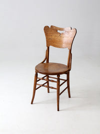 antique bentwood chair with cutout back