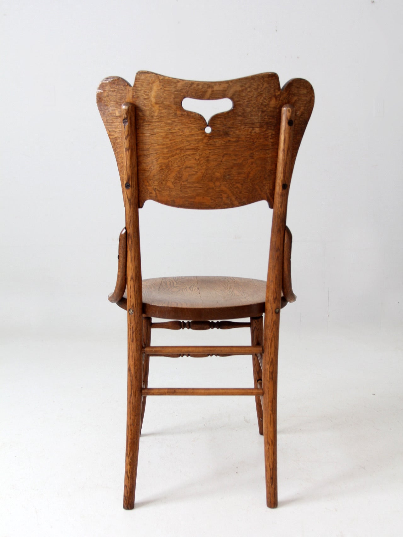 antique bentwood chair with cutout back
