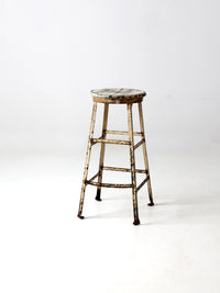 vintage industrial stool with wood seat