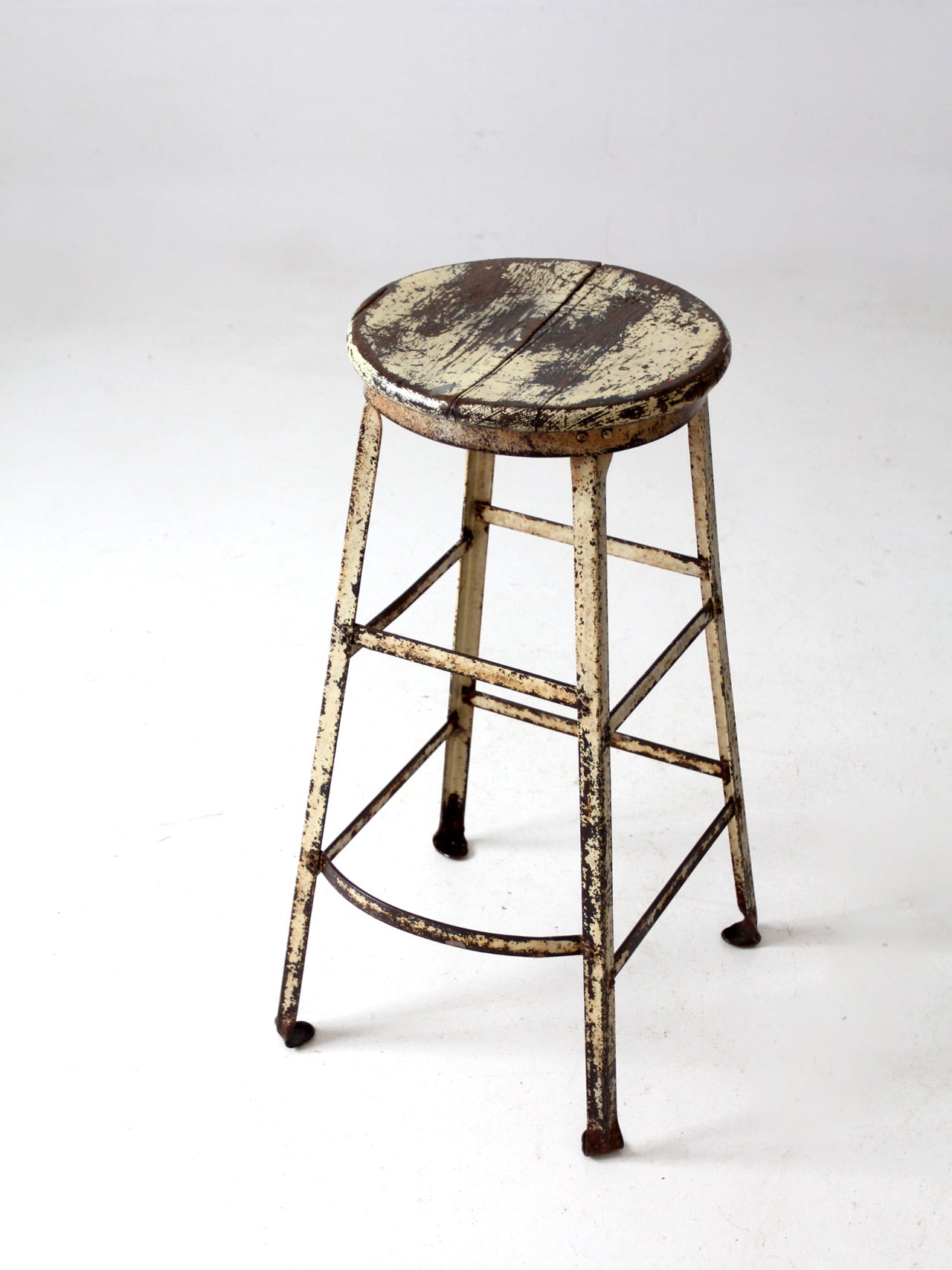 vintage industrial stool with wood seat