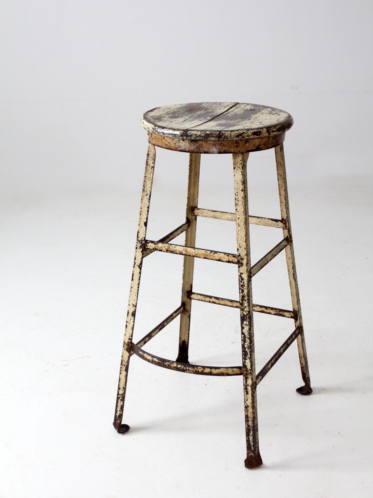 vintage industrial stool with wood seat