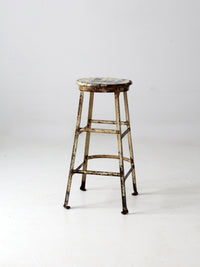 vintage industrial stool with wood seat