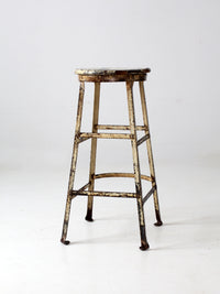 vintage industrial stool with wood seat