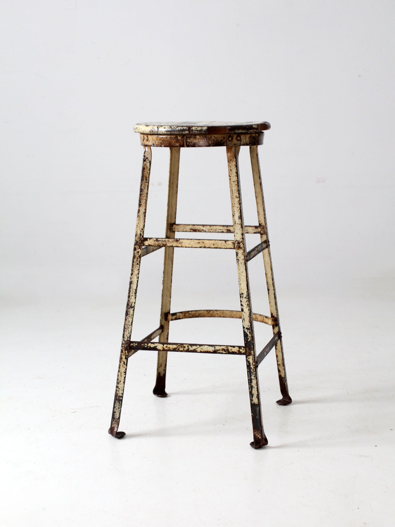 vintage industrial stool with wood seat