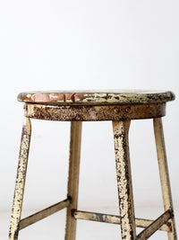 vintage industrial stool with wood seat