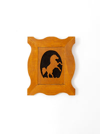 vintage horse silhouette art on wood