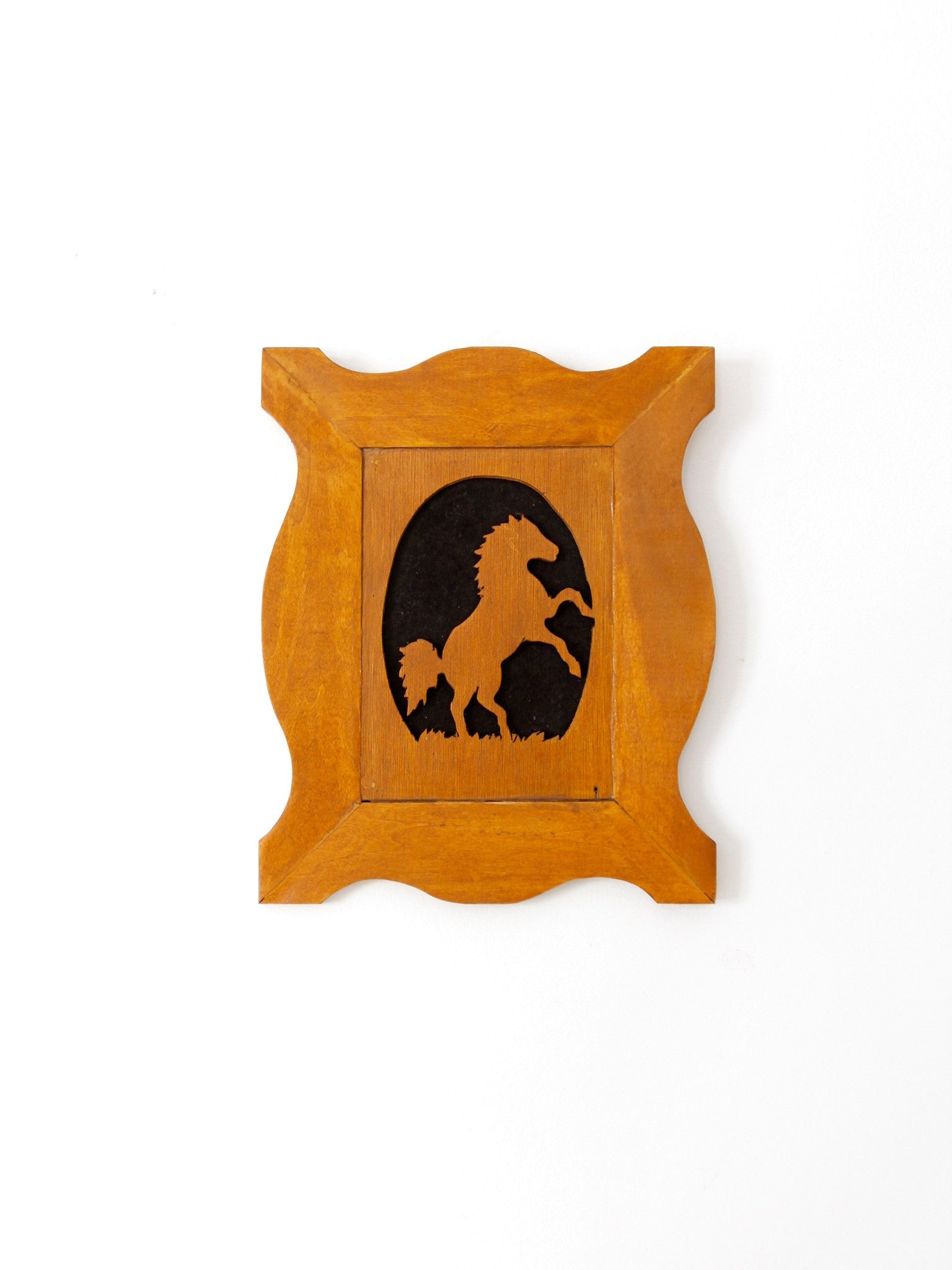 vintage horse silhouette art on wood