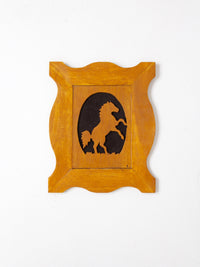 vintage horse silhouette art on wood