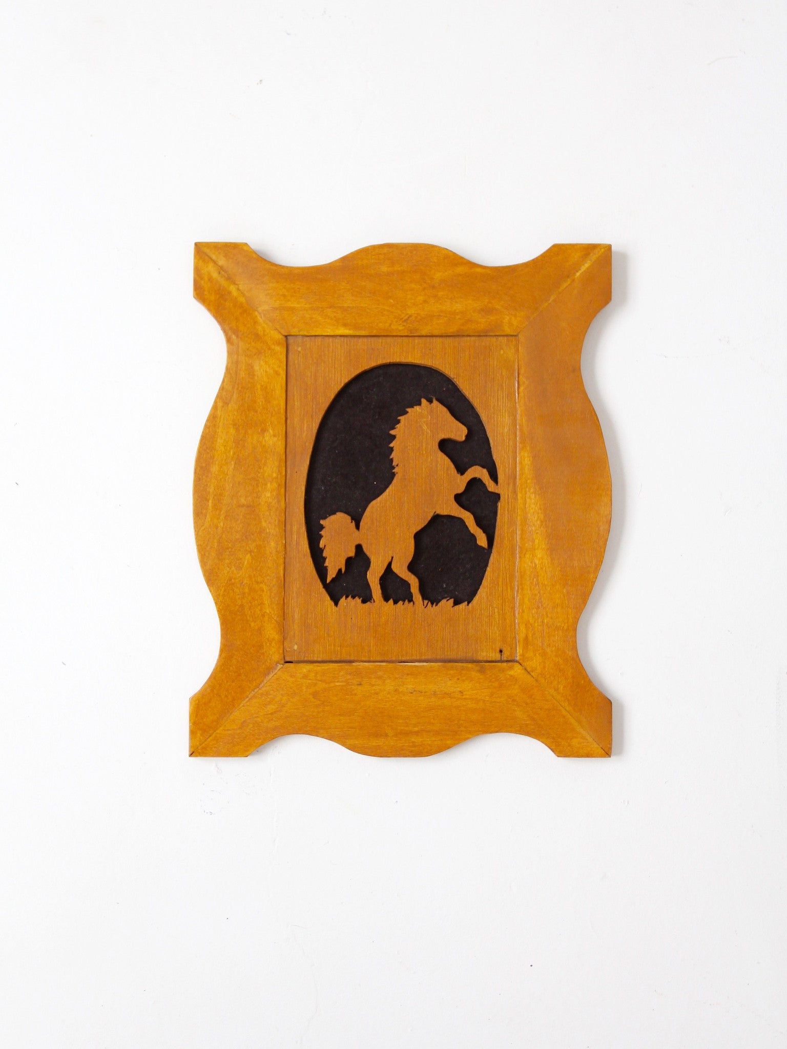 vintage horse silhouette art on wood