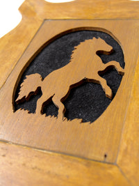 vintage horse silhouette art on wood