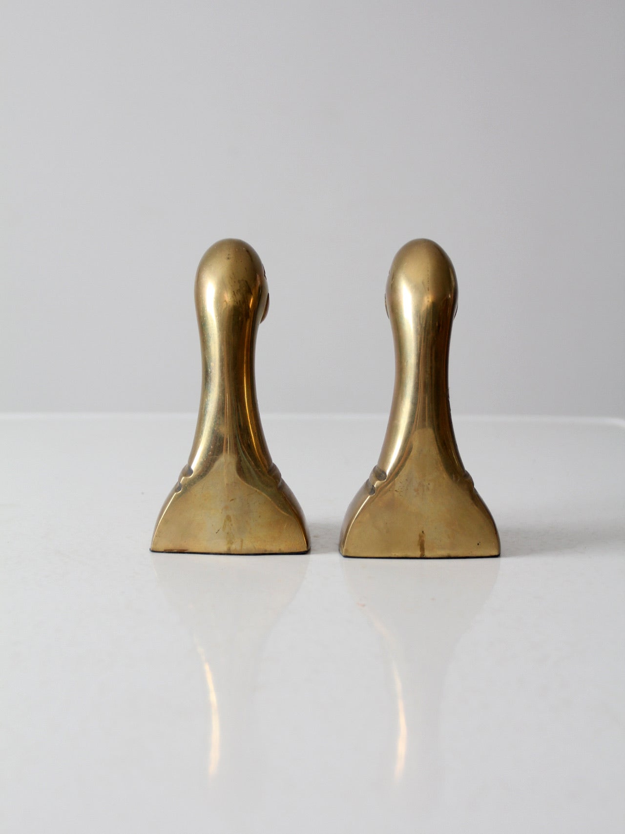 mid-century brass duck bookends