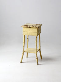 antique bamboo side table with storage top