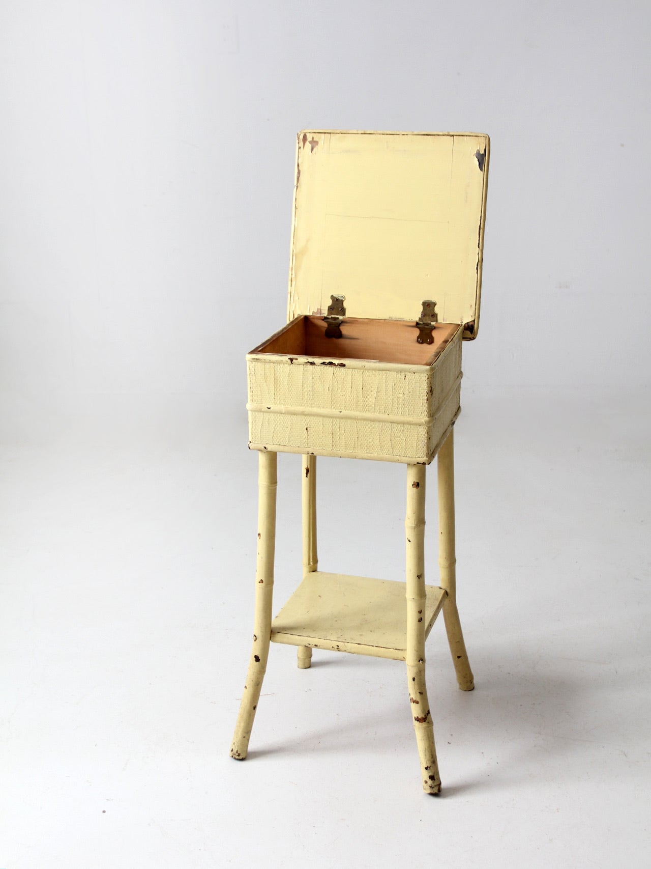 antique bamboo side table with storage top