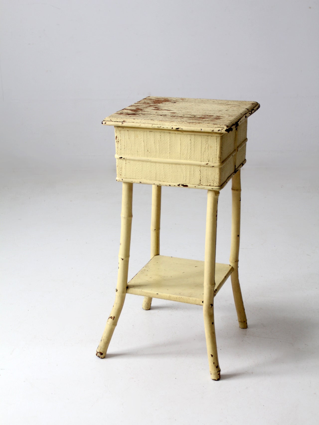 antique bamboo side table with storage top