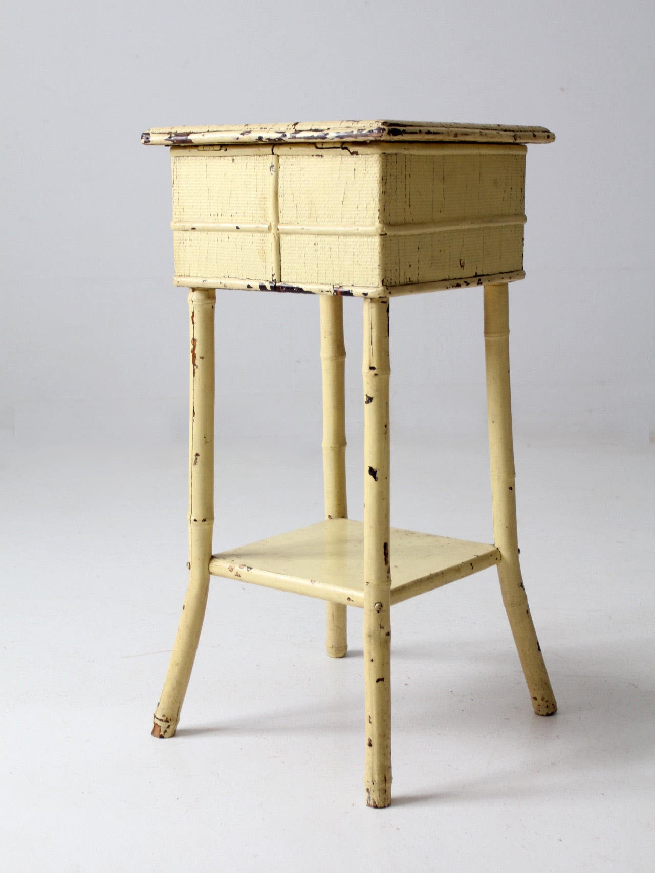 antique bamboo side table with storage top